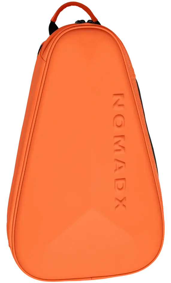 NomadX Hardshell Padel Backpack in Sunset Orange, standing upright, three-quarter view