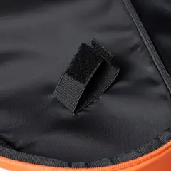 Inside the NomadX Hardshell Padel Backpack in Sunset Orange, hook-and-loop racket strap