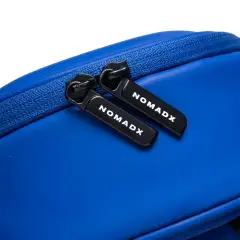Zipper pull and NomadX branding on the Electric Blue bag
