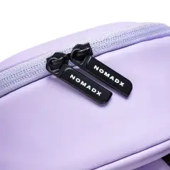 Zipper pull and NomadX branding on the Lilac Purple bag
