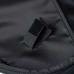 Inside the NomadX Hardshell Padel Backpack in Pitch Black, hook-and-loop racket strap
