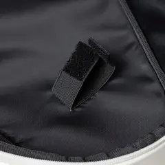 Inside the NomadX Hardshell Padel Backpack in Snow White, hook-and-loop racket strap